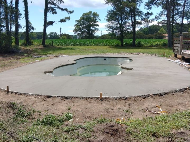 tgolandandseptic-concrete-work-around-swimming-pool